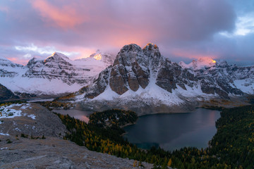 Pastel colors bathe Canadian Rocky Mountain peaks during a cold September day