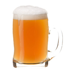 Cold mug of light beer with foam isolated on white background.