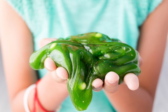 Colorful Of Homemade Toy Called Slime, Kids Having Fun And Being Creative By Science Experiment.