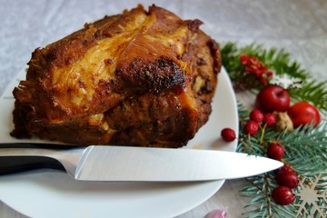 Pork roasted meat - pork neck in herbs and spices. Christmas roast
