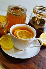 Hot tea with spices, honey and syrup - an alternative to antibiotics - selective focus
