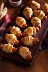Pigs in blankets. Dark mood