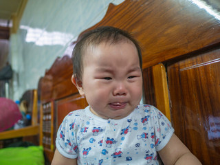 Cutie asian infant crying very hard