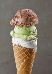 various ice cream balls in waffle cone