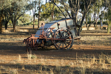 Fototapeta na wymiar Abstract antiquated farm equipment in community park, Quorn, South Australia