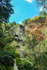 Stone cliff with blue sky in erawan waterfall natiaonal park kanchanaburi,thailand