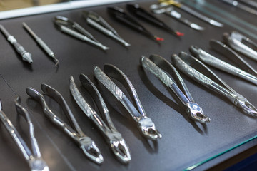 Dental tools and equipment. Over dark background