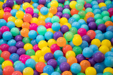 Fototapeta na wymiar colorful plastic balls for kid activity of indoor playground.