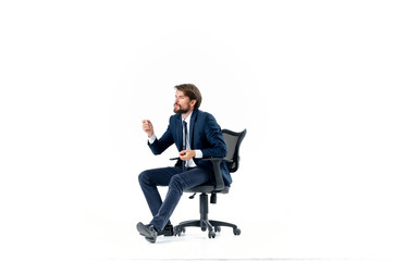 business man sitting in an office chair