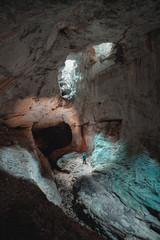 Tourist in the Occidental Carpathians, Radesei Cave, Romania, Mysterious cave, Apuseni Mountains, Romania