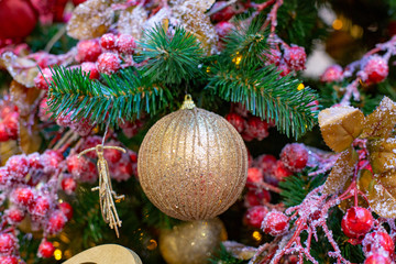 Closeup on Christmas tree decoration over festive background