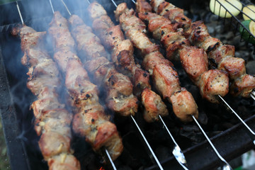 Cooking pork kebabs on skewers