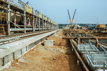 Fototapeta premium steel pipes on a newly built industrial enterprises