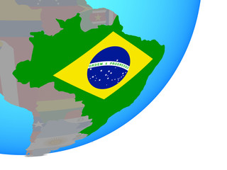 Brazil with embedded national flag on blue political globe.