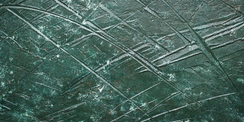 Dark green acrylic painted wooden background with rough texture