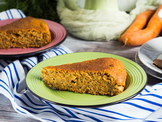 Spiced carrot cake with walnuts and cinnamon with breakfast setting background