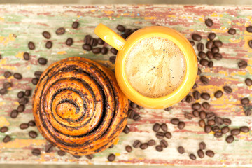 A cup of coffee with kanelbulle.