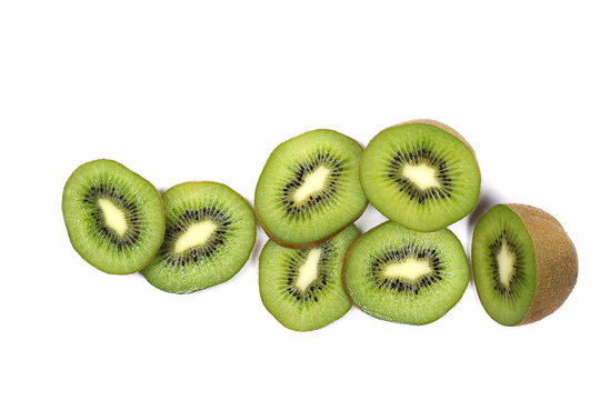 Kiwi fruit slices isolated on white background, top view