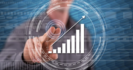 Man touching a financial growth concept