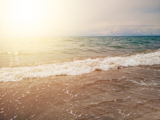Small wave on a sunny day by the sea. 