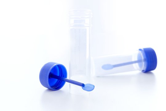 Stool sample container and spatula