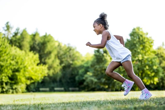 Girl running in park