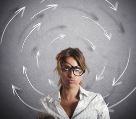 Confused businesswoman has dizziness. Concept of stress and overwork