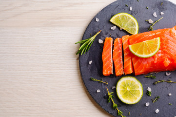 Fresh trout piece on on slate board