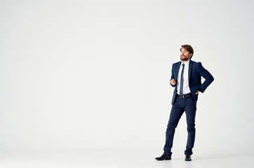 man in a suit on a light background free place