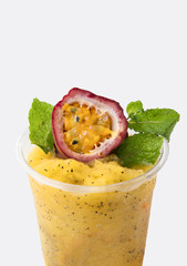 Freash tropical passion fruits smoothie on white background,isolate
