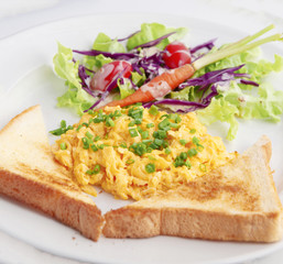 breakfast,scrambled egg with freash salad and toast