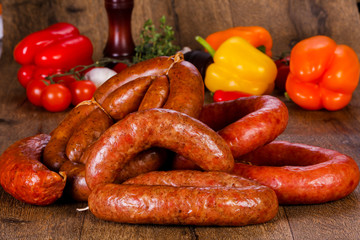 Pork sausages over wooden