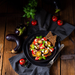 Eggplant grilled with aromatic feta cheese and tomatoes