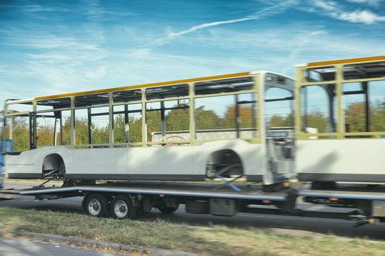 picture of a bus on a trailer body mannheim truck