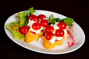Bruschetta with cheese and tomato