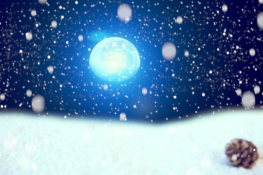 Christmas holiday. Snow covering field, night sky and moon. Christmas and New Year concept. The elements of this image furnished by NASA