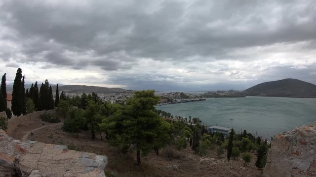 Chalcis, island of Euboea in Greece. South view from The Ottoman fortress of Karababa. Chalcis - a chief town of the island of Euboea. Cloudy Sky. Windy Weather. Gimbal Stabilized 4K.