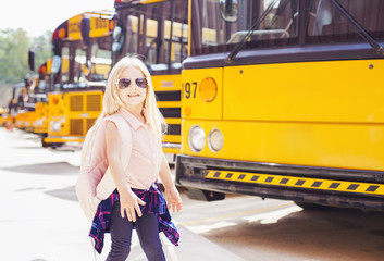 Little girl at school bus