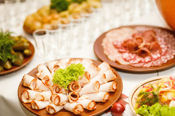 Beautifully decorated catering banquet table with different food