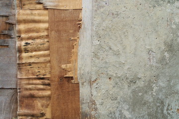 Obraz na płótnie Canvas Rustic patchy wooden wall background
