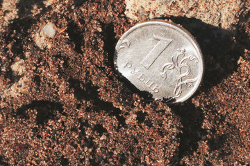 One ruble on the ground. Coin.