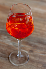 A glass of cocktail with ice.