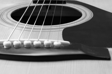 Obraz premium Close up black and white of acoustic guitar