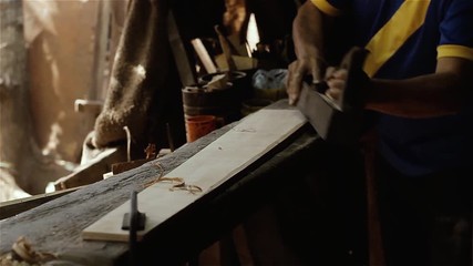 Man Working The Wood. Manufacture Of Musical Instruments.
