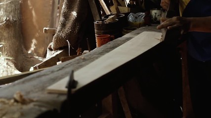 Man Working The Wood. Manufacture Of Musical Instruments.