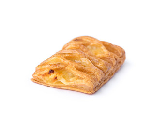 close up of crispy pineapple pie isolated on white background