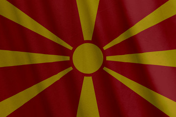 Waving Macedonian flag with a fabric texture