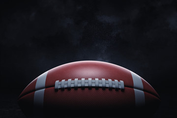 3d rendering of a leather ball for American football lying with its seams in focus on a dark background. © gearstd