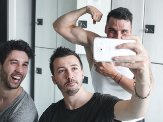 happy friends at the gym after exercising