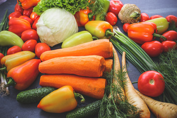 A rich variety of autumn colorful bright and fresh vegetables and roots.